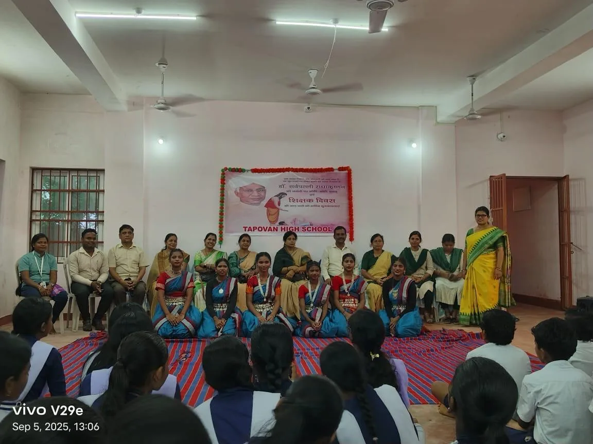 Students attending an indoor youth development session with trainers.